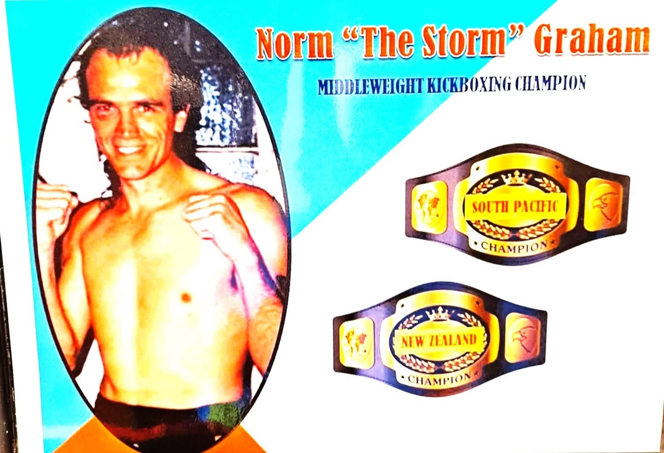 Norm ‘The Storm’ Graham with New Zealand and South Pacific championship belts